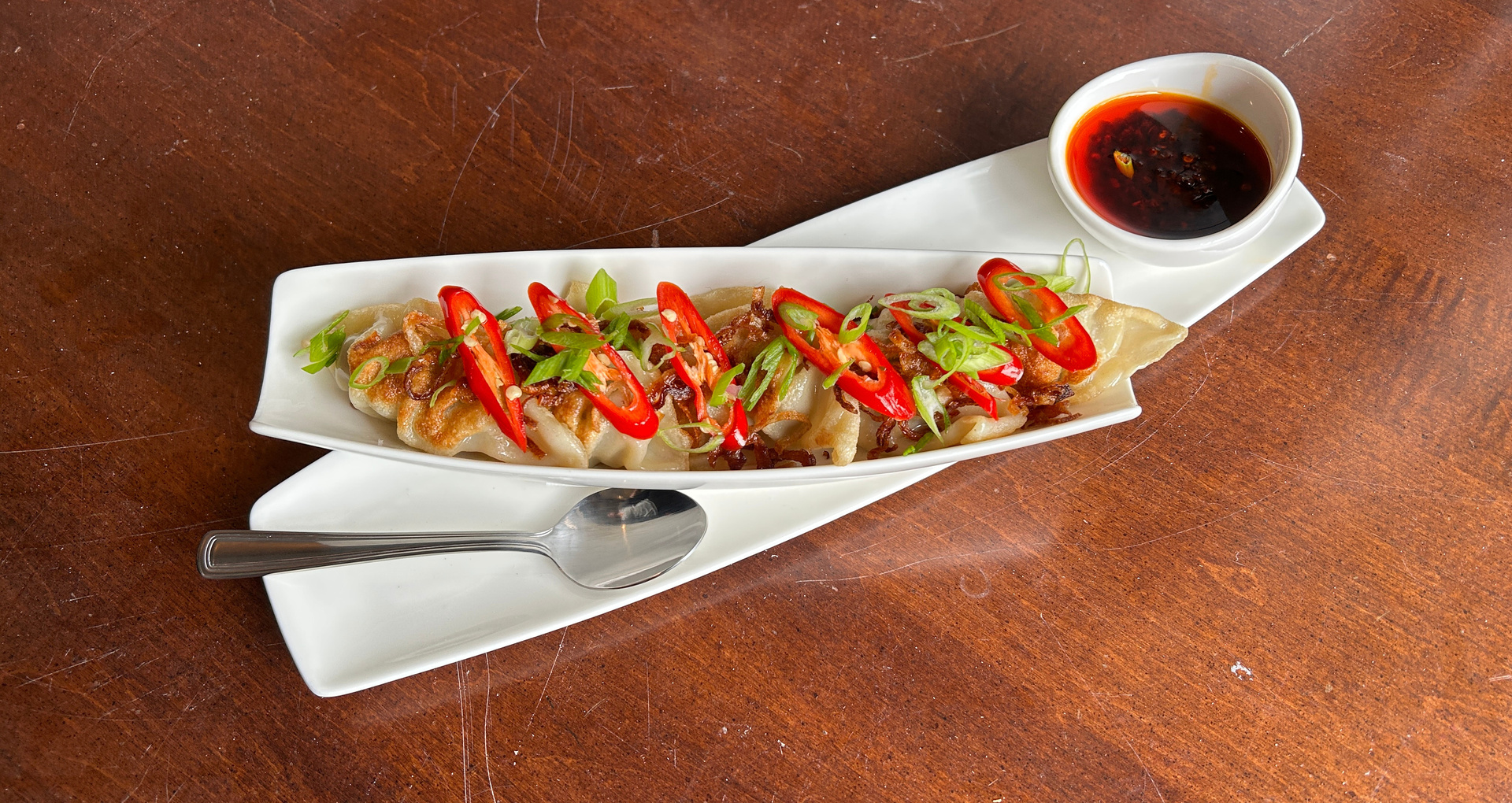 Wagyu Chili Dumplings with scallions, red chili and dipping sauce